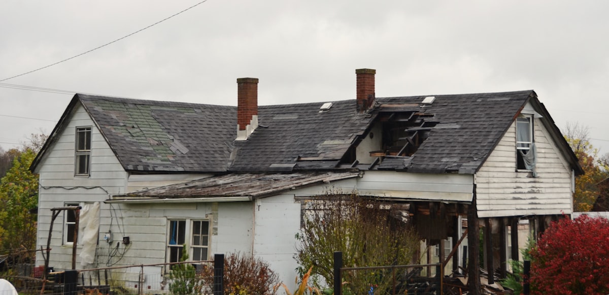 Storm-damaged roof needing emergency repair