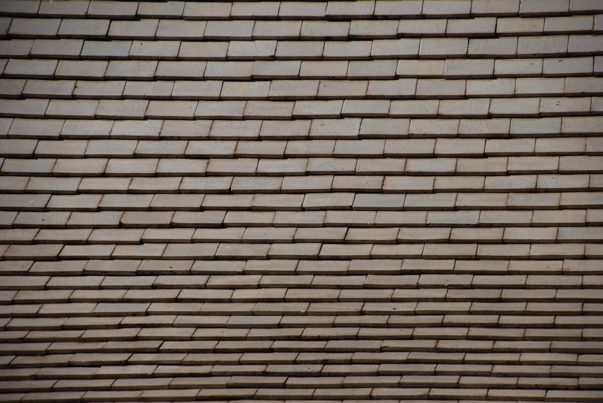 Roof tile repair close-up
